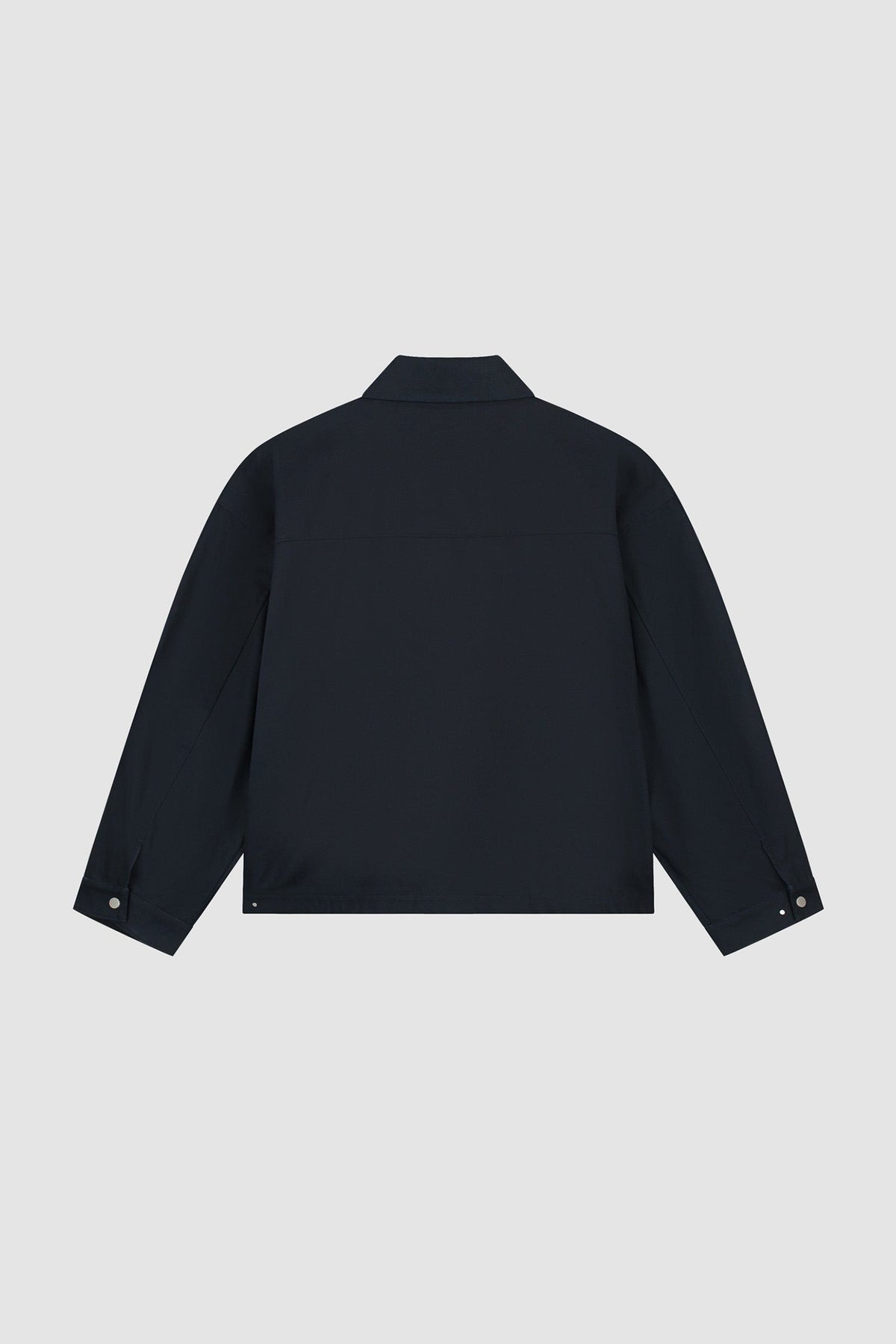 Arte Antwerp Jacke Canvas Atelier navy – Packshot Rückseite auf grauem Hintergrund