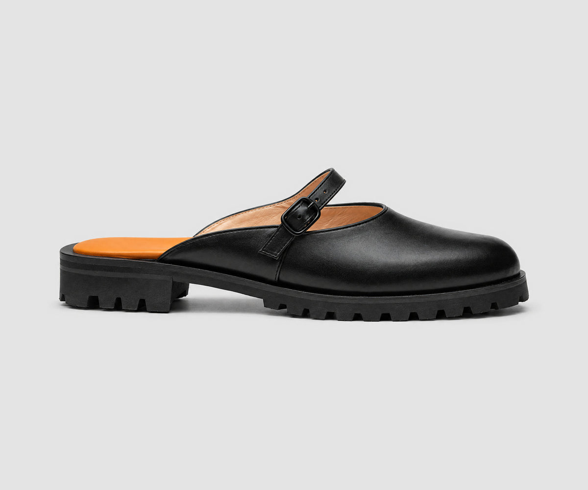 JF Clarin Mule Touquet noir – vue de profil sur fond gris