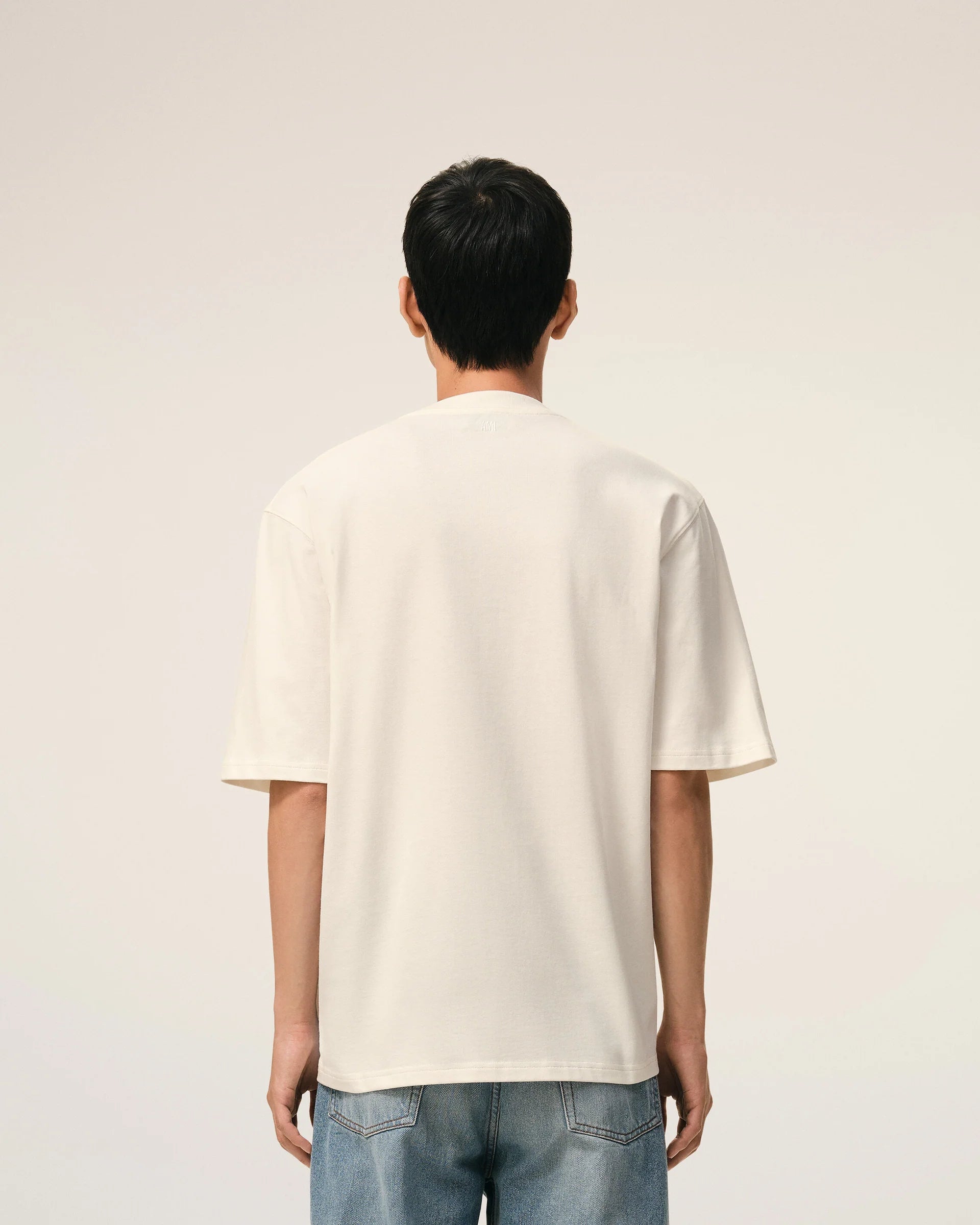 Ami Paris - T-shirt épais boxy avec Ami de coeur embossé - Blanc crème